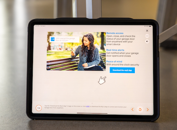 tablet screen displaying the BILT app with a screen inviting users to download the Chamberlain myQ app